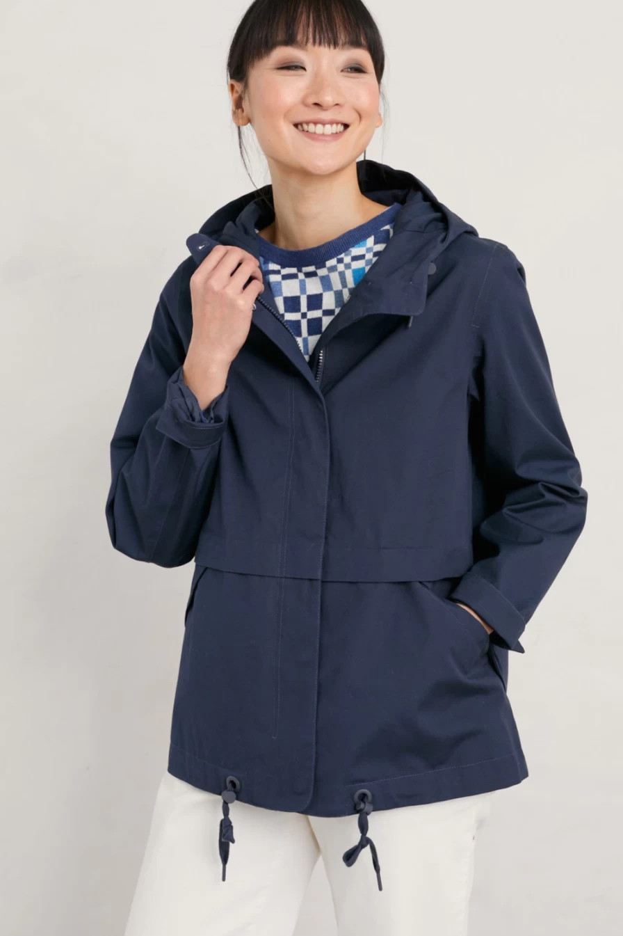 "Seasalt Cornwall Women's Blue Depth Waterproof Jacket – Lightweight Raincoat for Outdoor Activities"